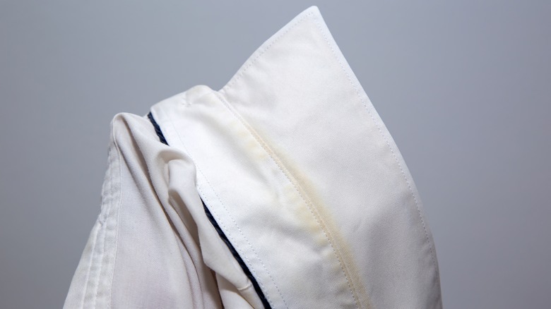 white shirt with collar stain