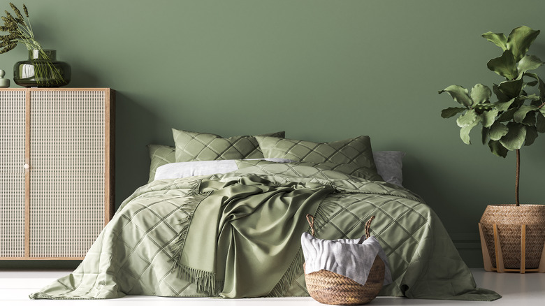 bedroom with green bedding