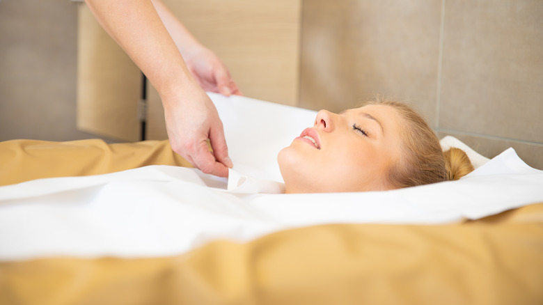 Lady sleeps on waterbed