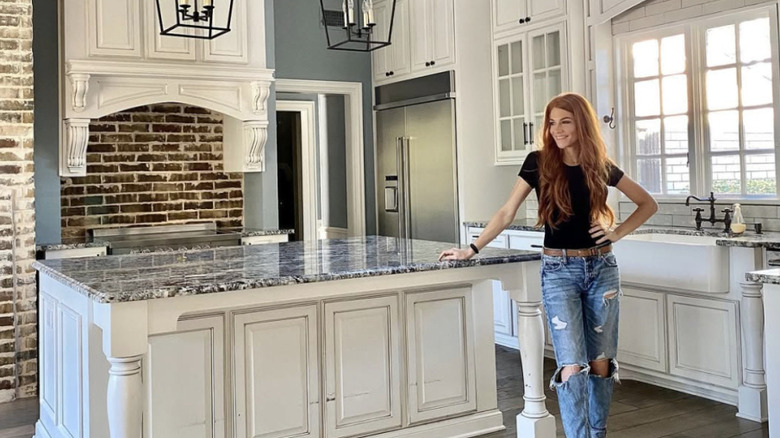 woman standing in kitchen