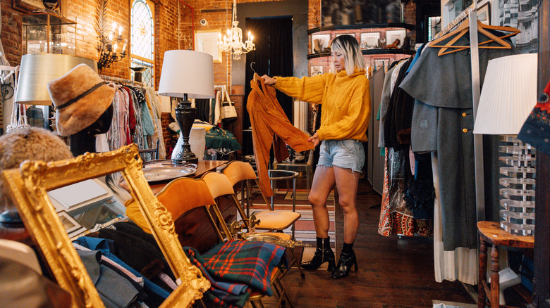 older woman thrift shopping