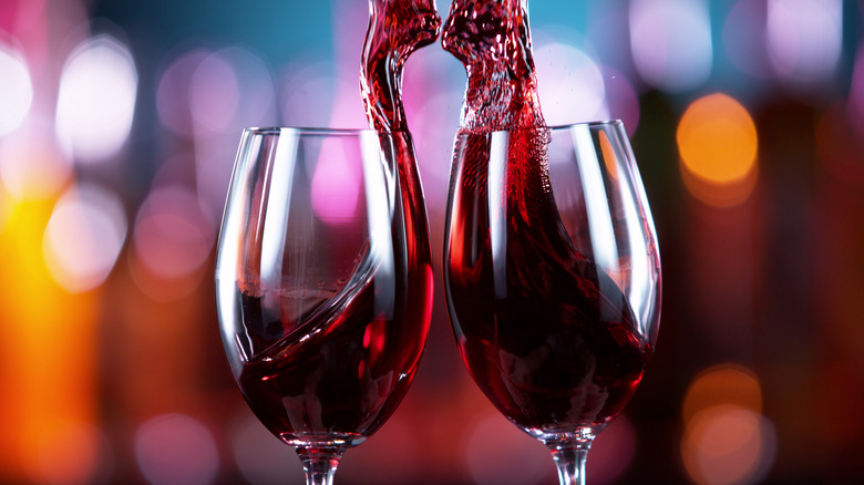 Wine being poured into glasses