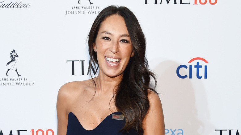 Headshot of Joanna Gaines on a red carpet for the Time100 most influential people event.