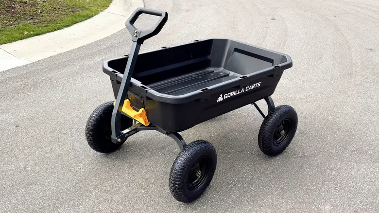 A Gorilla Cart garden cart on asphalt