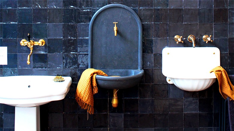 Three sinks in a bathroom