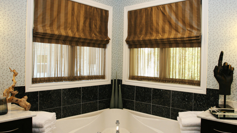 bathroom with drapes