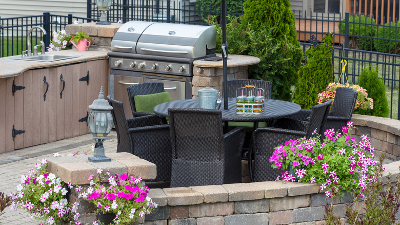 outdoor kitchen on brick patio