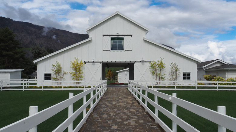 white barndominium house