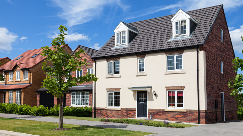 quaint beige and brick cottage