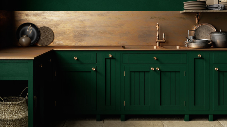green cabinets with wood countertops