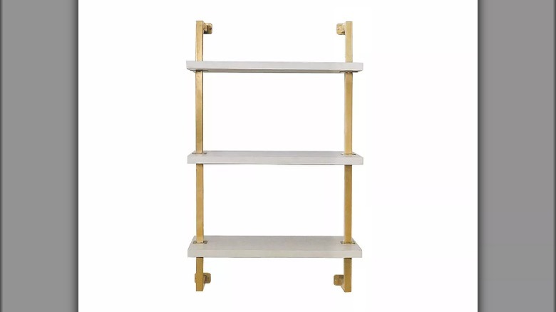 white and gold shelf