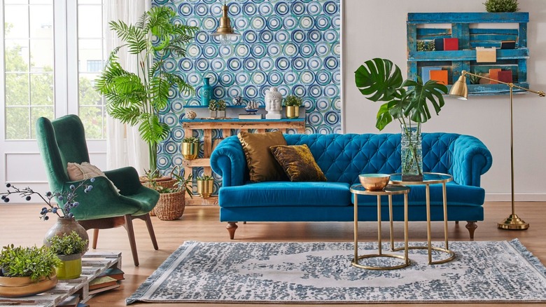 Blue couch maximalist living room