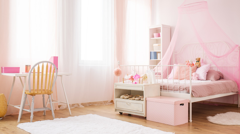 bedroom with pink canopy 