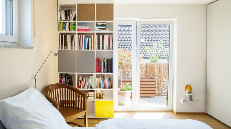 small bedroom with books