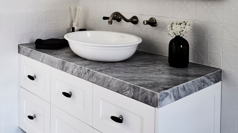 gray marble on white vanity