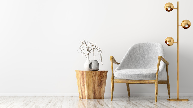 Chair and gold floor lamp