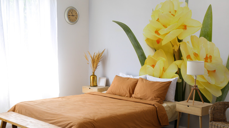 bedroom with giant wall flower