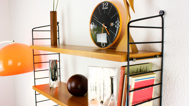 shelf with a vintage clock