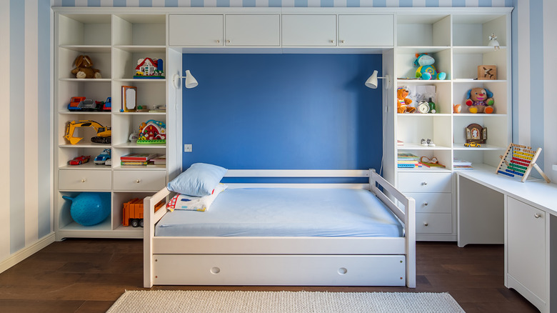 Bedroom with built-in bookcases