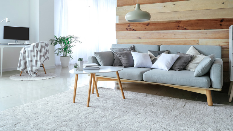 living room with wood wall