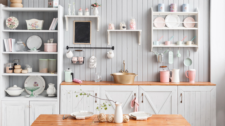 open shelving along gray shiplap
