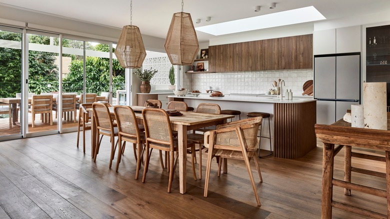 Rattan kitchen chairs and lighting fixtures.