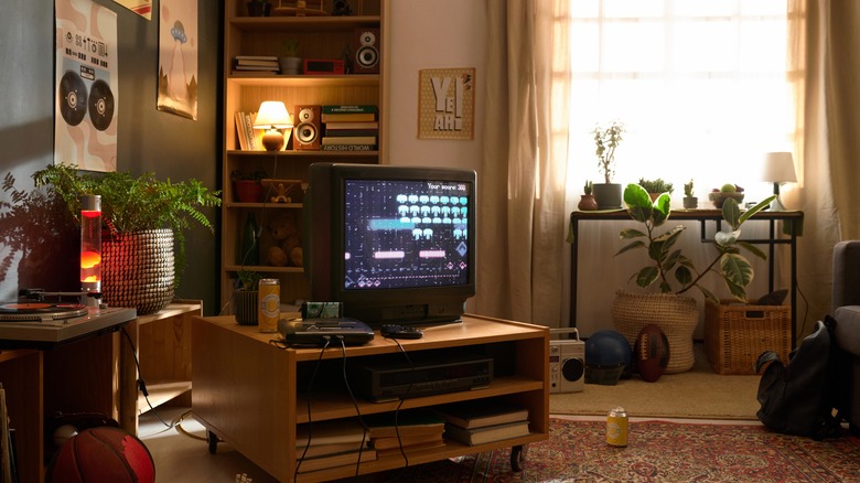 A living room set up full of retro technology.