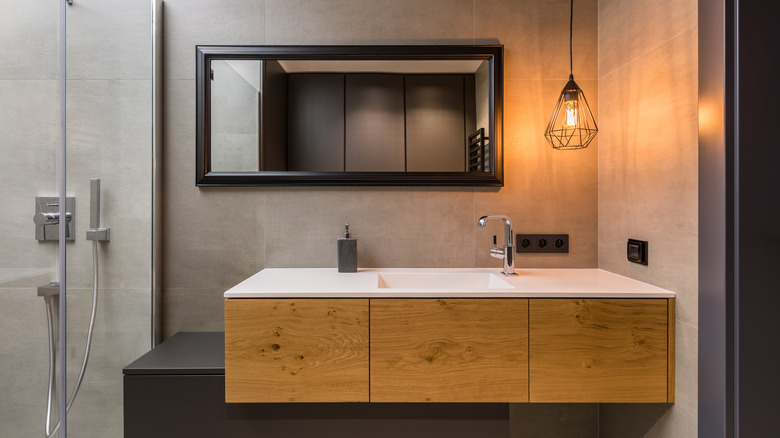 bathroom with blonde wood