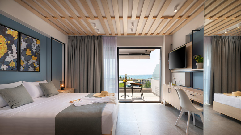 wood planks on ceiling in bedroom