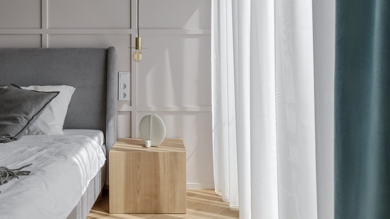 bedroom with blonde wood accents