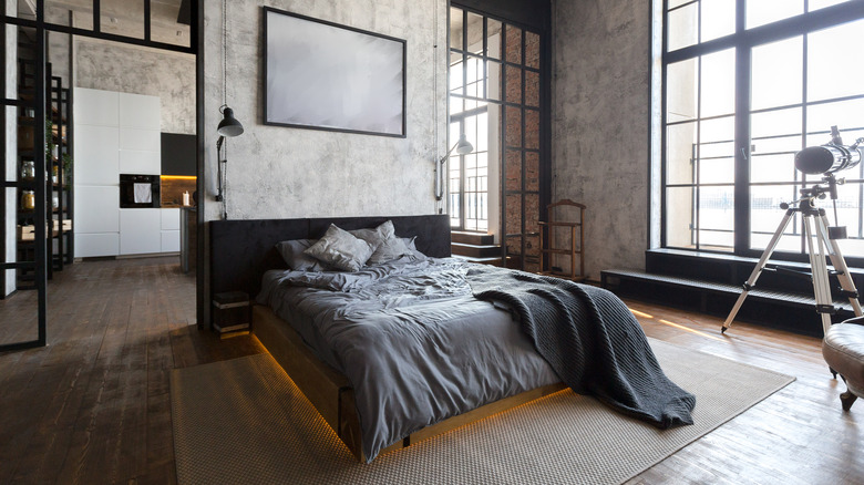 Dark, modern loft bedroom