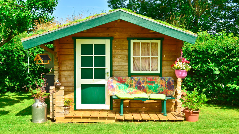 shed trimmed in green