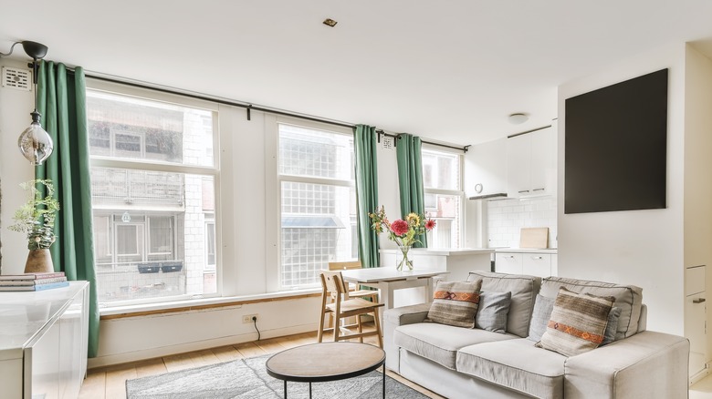 plain room with green curtains