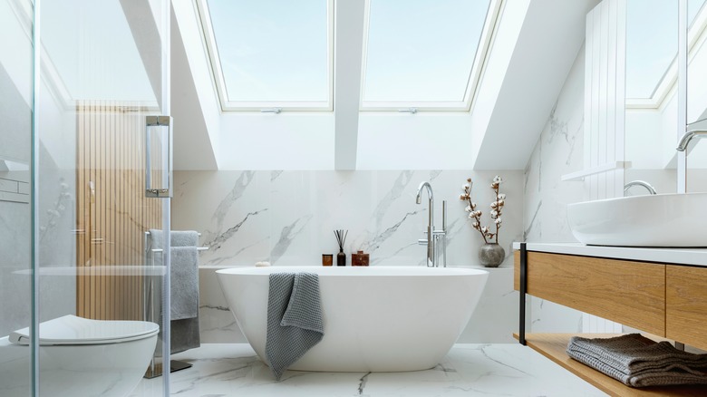 bathroom with pitched windows