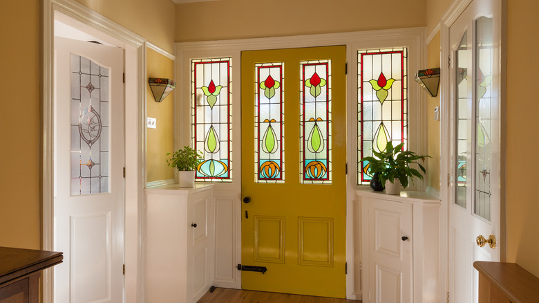 hallway with stained glass door