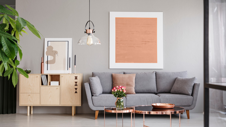 large painting over sofa