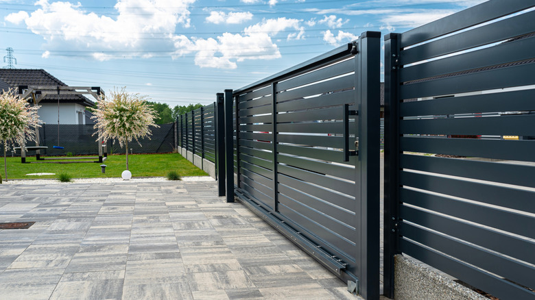 steel gates at entrance to community