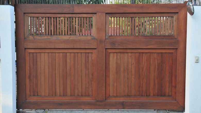 wooden gate at front of home