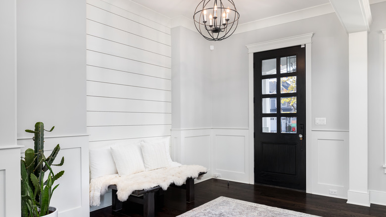 shiplap wall with front door