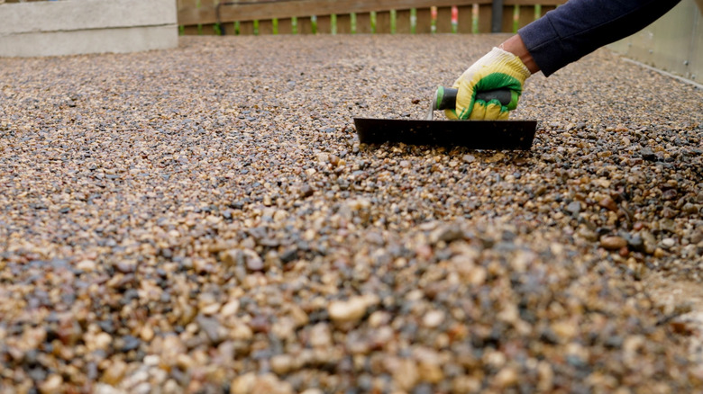 Smoothing out gravel on driveway