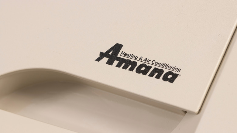 An Amana logo on a white appliance