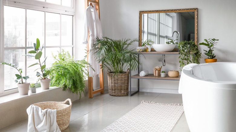bathroom with lush greenery