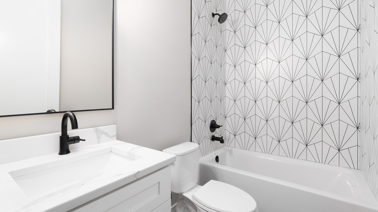bathroom with patterned tile