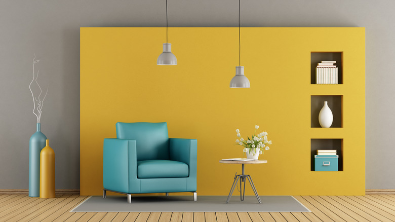 Yellow accent wall in room