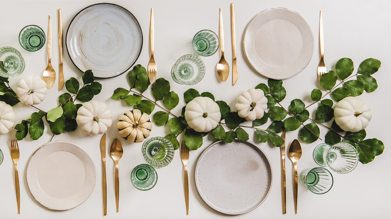 white pumpkins in table centerpiece
