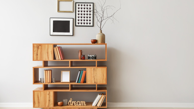 unique bookshelf against wall