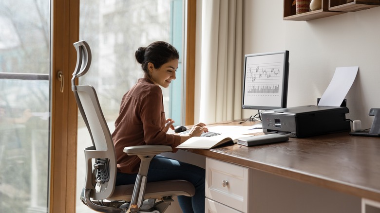 woman smiling in home office