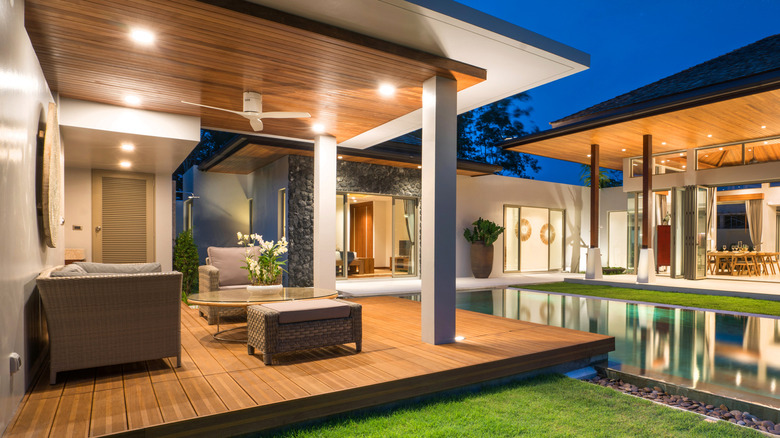 covered deck with bright lights