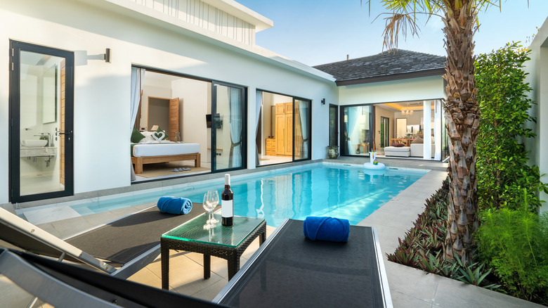 a pool house with hood