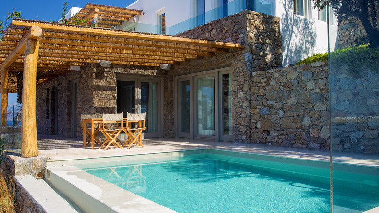 a shaded pool house